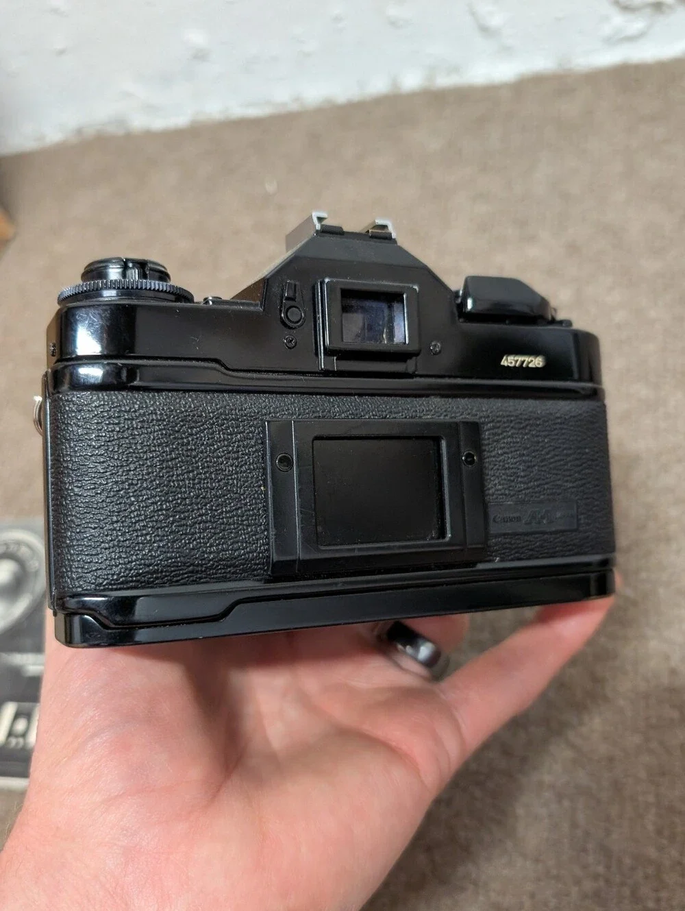 Vintage Canon A-1 Black SLR Camera with Black Lens and Black Flash